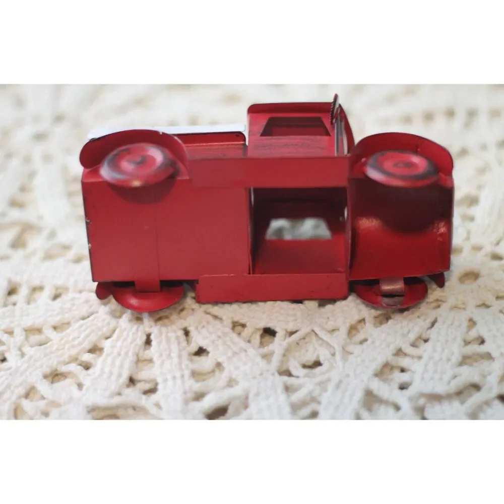 farmhouse style Christmas ornament with vintage style red pickup truck and tree